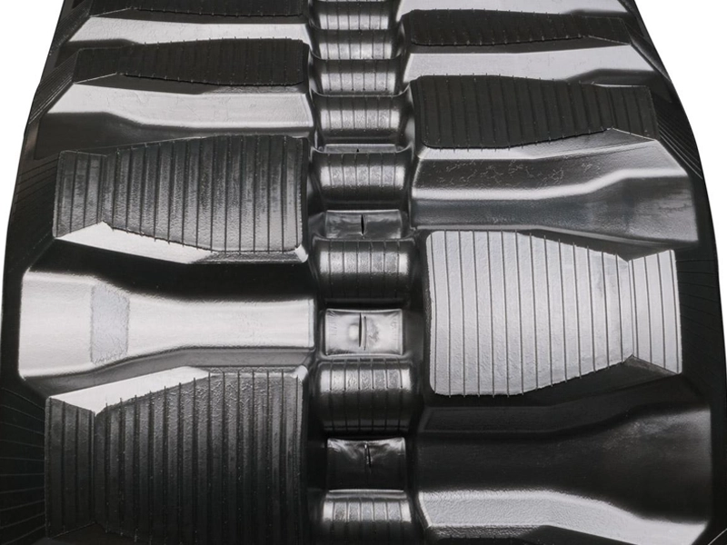 A close up of the bottom of a tractor tire.
