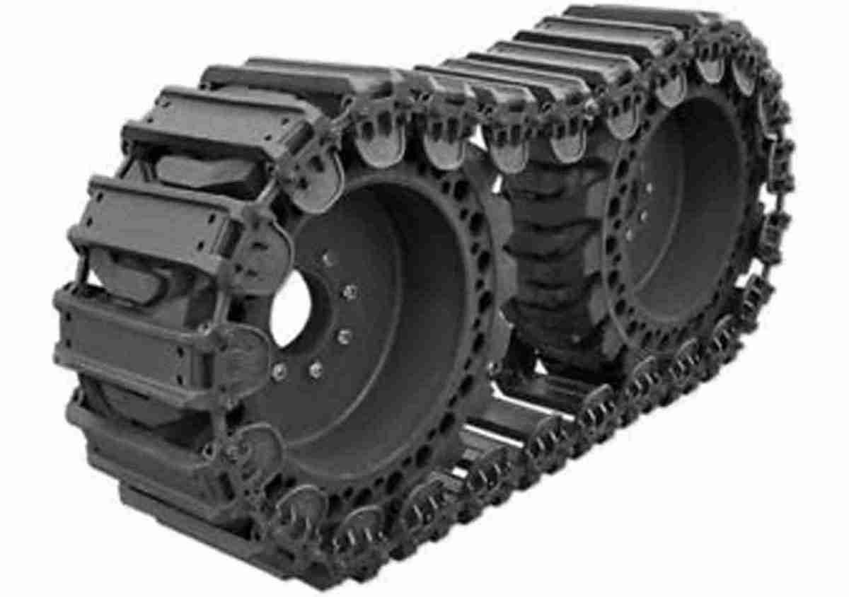 ott_steelpads-scaled A close up of the bottom of an industrial machine