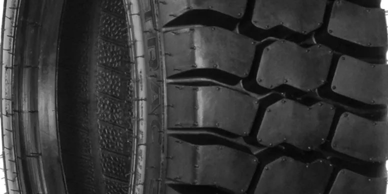 rs=w_776,h_388,cg_true,m A close up of the tire tread on a vehicle.
